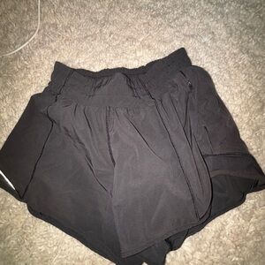 Size 2 Lulu black shorts 4” in. perfect condition